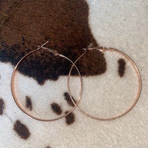 a pair of gold hoops